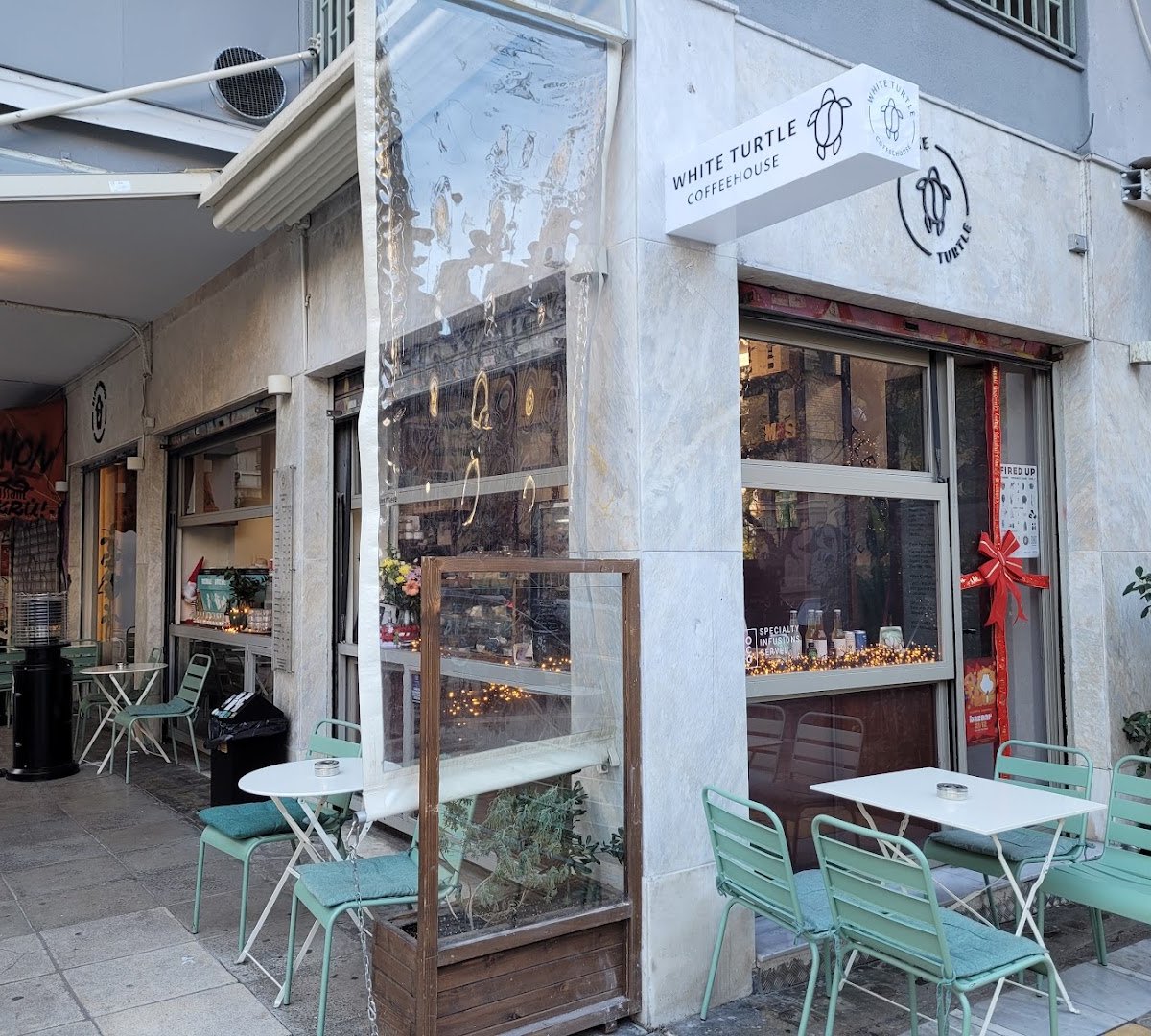 Storefront of White Turtle Coffeehouse, specialty coffee shop in Athens