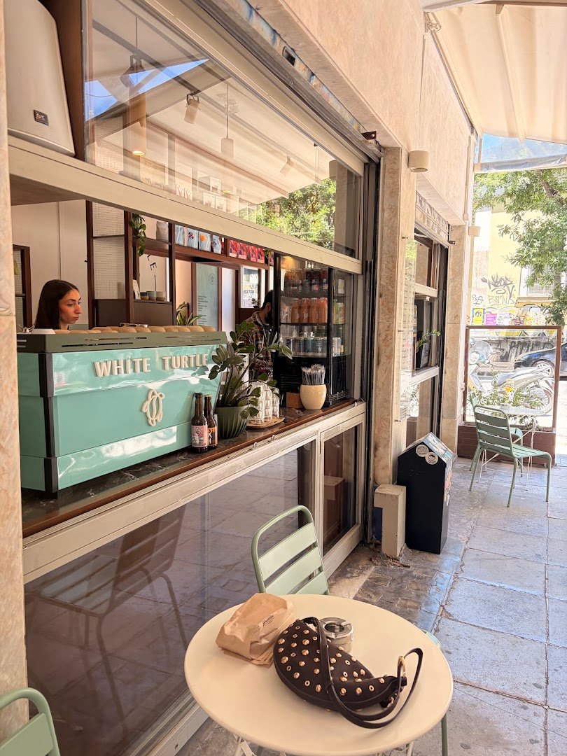 Interior of White Turtle Coffeehouse, specialty coffee shop in Athens