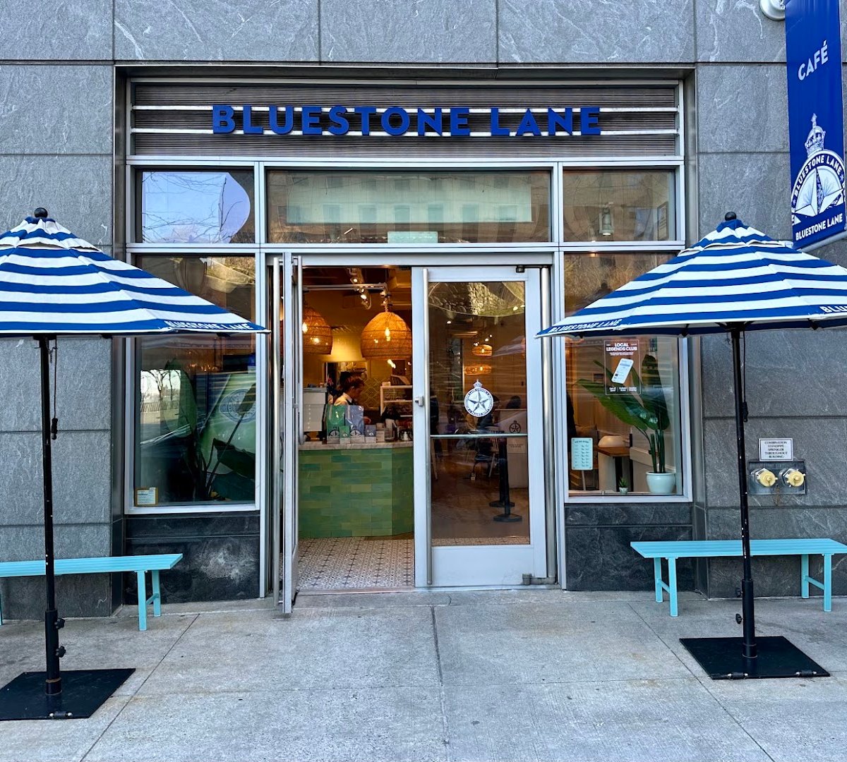 Storefront of Bluestone Lane Battery Park Café, specialty coffee shop in New York