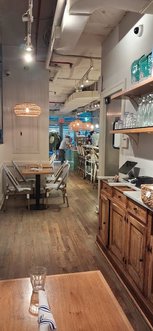 Interior of Bluestone Lane Battery Park Café, specialty coffee shop in New York