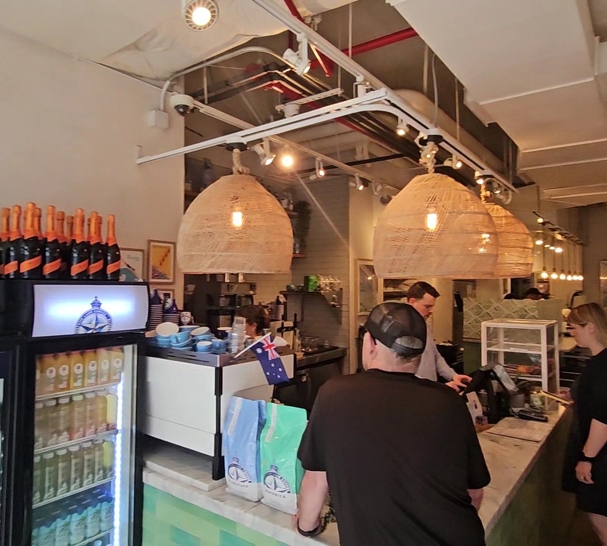 Interior of Bluestone Lane Battery Park Café, specialty coffee shop in New York