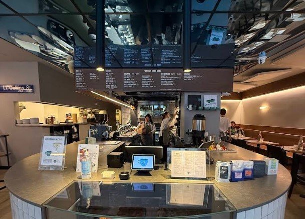 Interior of Little Collins, specialty coffee shop in New York