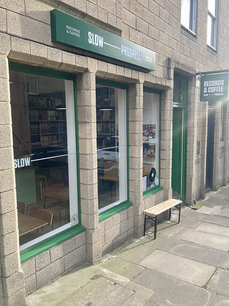 Storefront of Slow Progress Records & Coffee, specialty coffee shop in Edinburgh