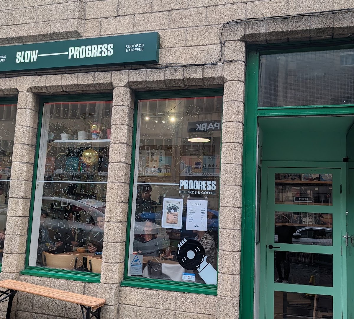 Storefront of Slow Progress Records & Coffee, specialty coffee shop in Edinburgh