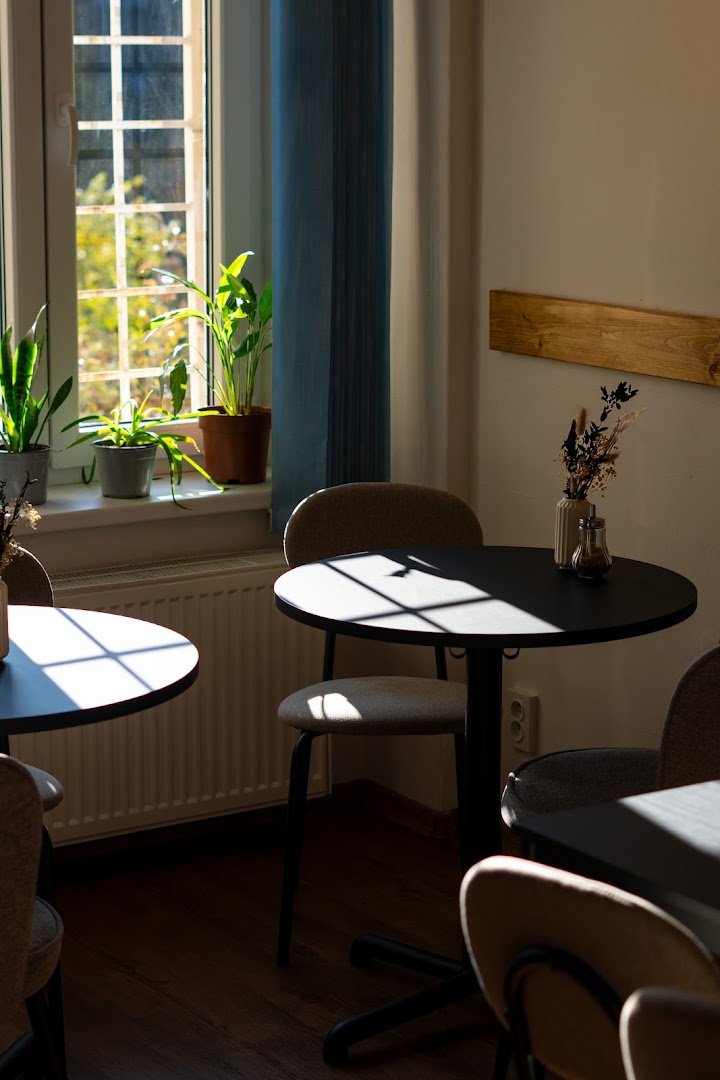 Interior of Penguin Coffee Strašnice, specialty coffee shop in Prague