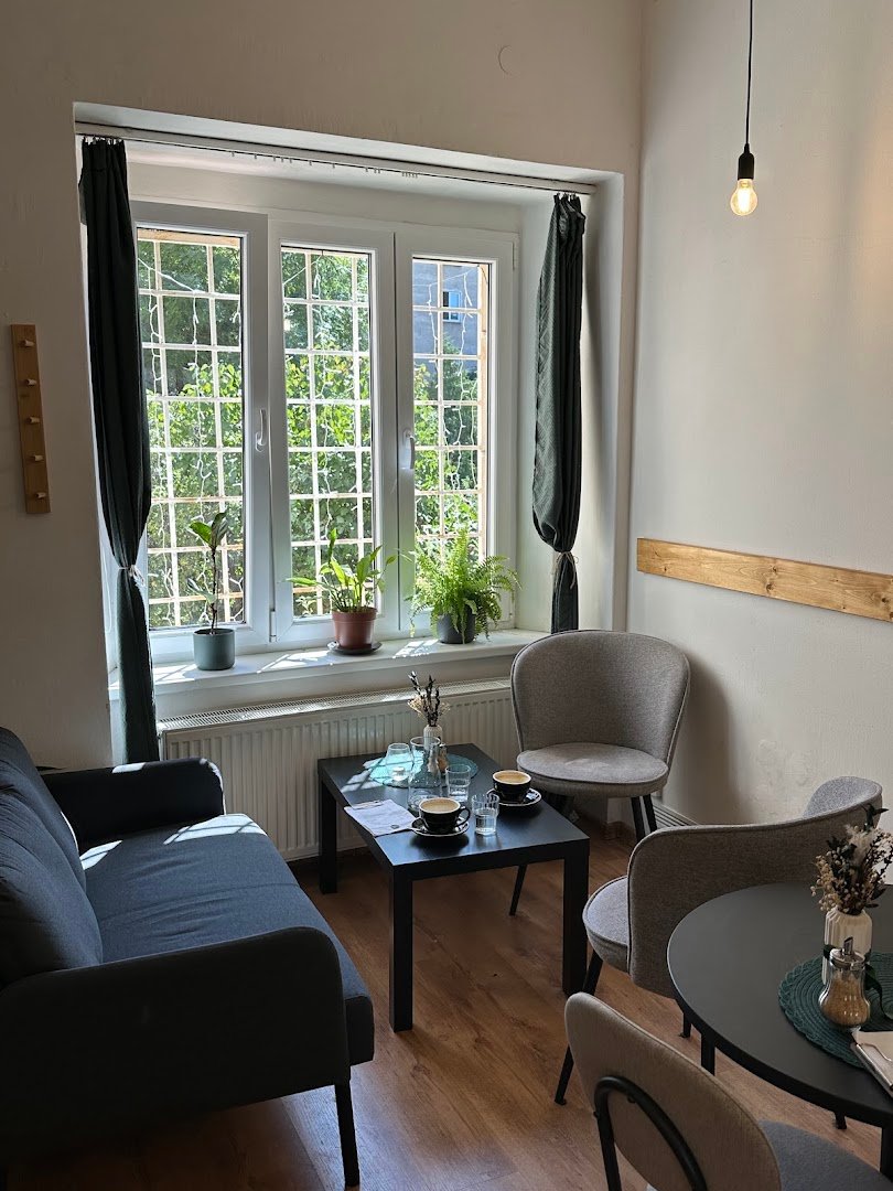 Interior of Penguin Coffee Strašnice, specialty coffee shop in Prague