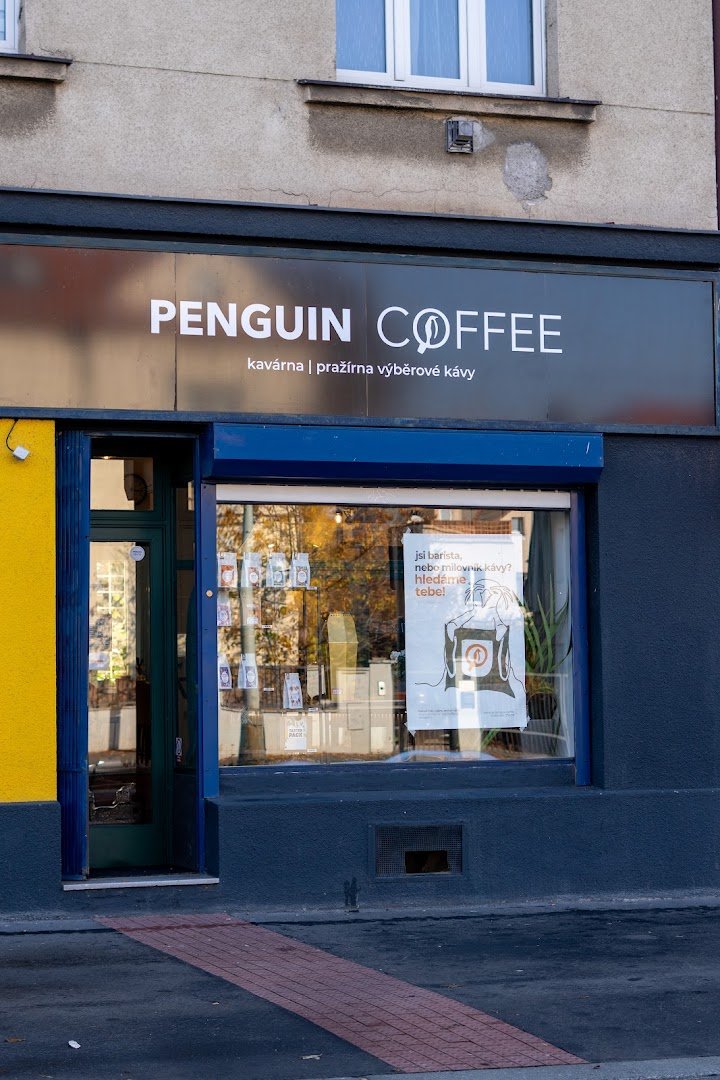 Storefront of Penguin Coffee Strašnice, specialty coffee shop in Prague