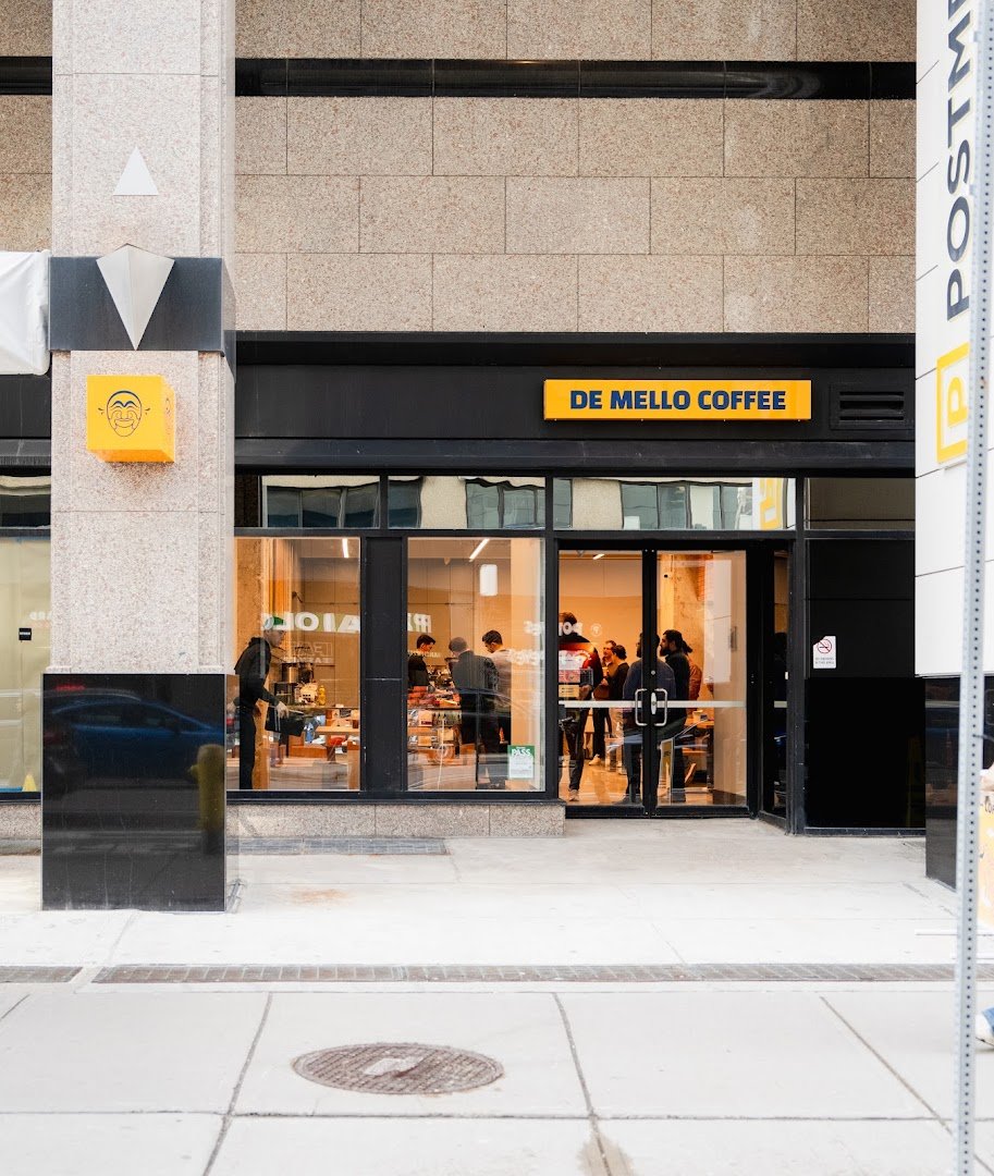 Storefront of De Mello Coffee, specialty coffee shop in Toronto