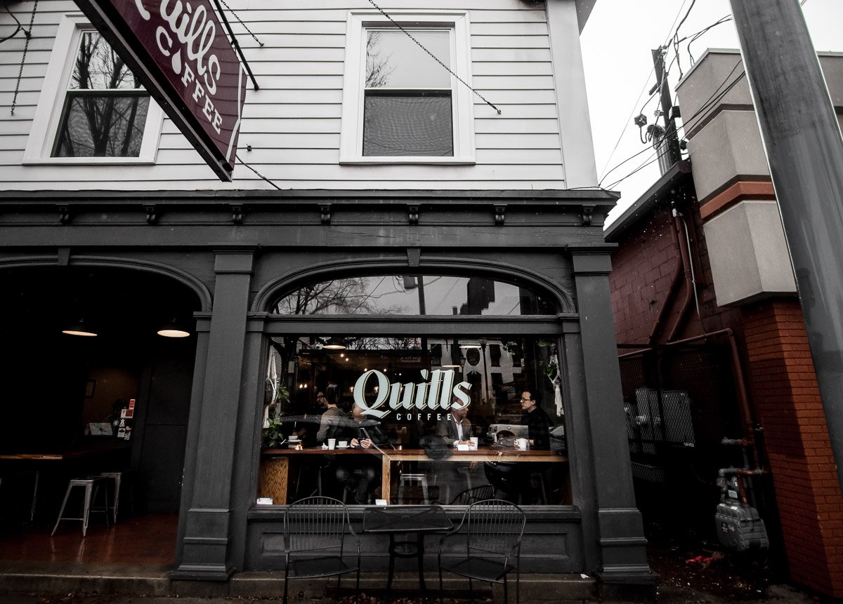 Storefront of Quills Coffee, specialty coffee shop in Louisville