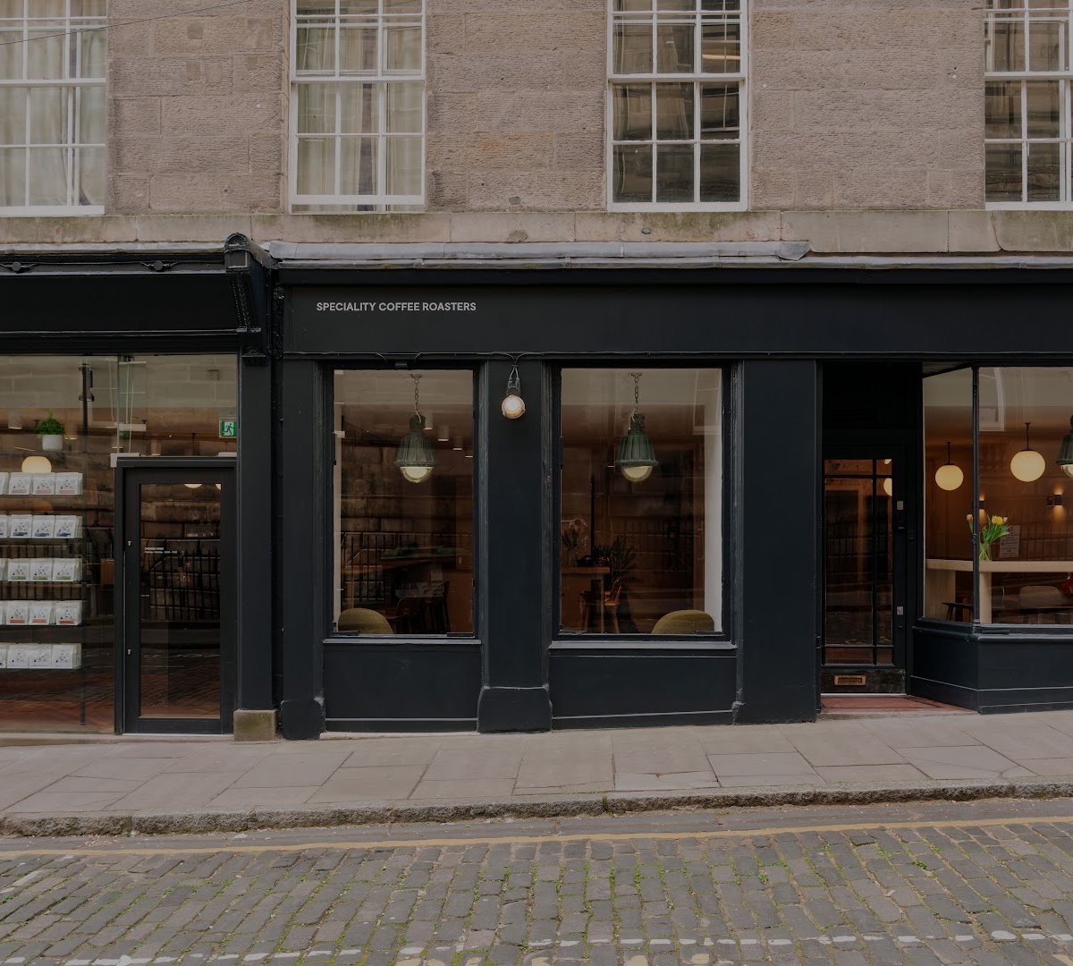 Storefront of Origin Coffee (South College Street), specialty coffee shop in Edinburgh