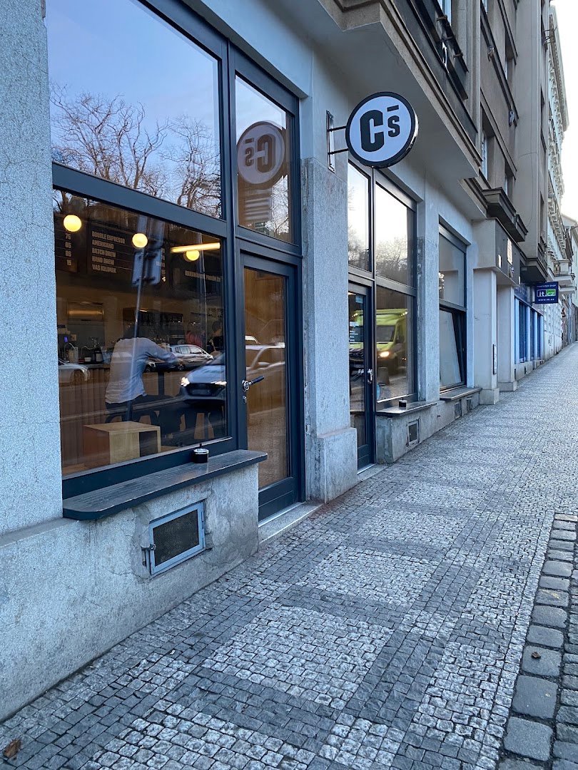 Storefront of Coffee Source Francouzská, specialty coffee shop in Prague