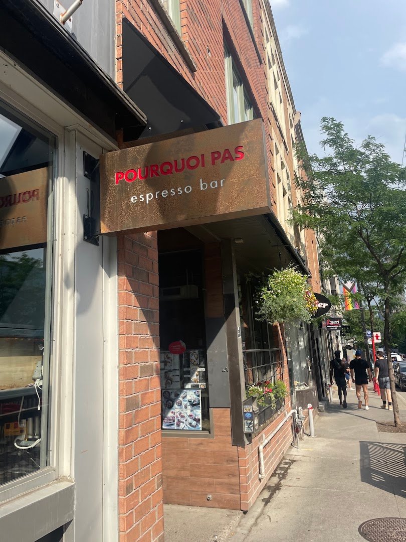 Storefront of Pourquoi Pas espresso bar, specialty coffee shop in Montreal
