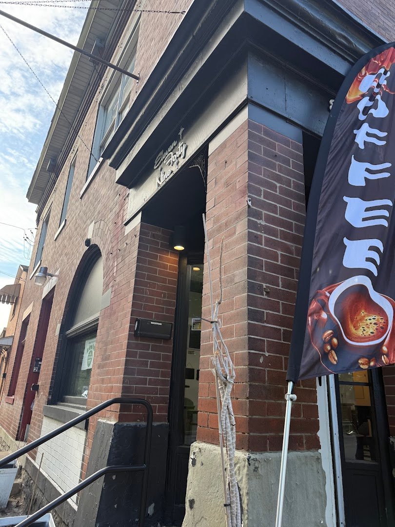Storefront of Compass Point Coffee, specialty coffee shop in Pittsburgh