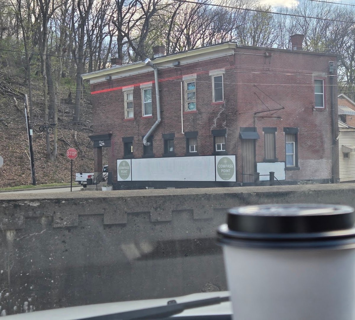 Storefront of Compass Point Coffee, specialty coffee shop in Pittsburgh