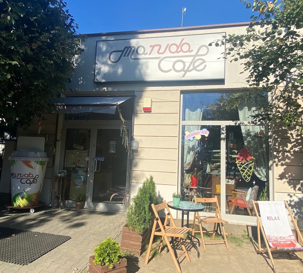 Storefront of Maruda Cafe, specialty coffee shop in Warsaw