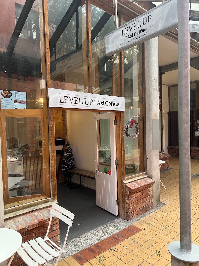 Storefront of LEVEL UP by Axl Coffee, specialty coffee shop in Wellington