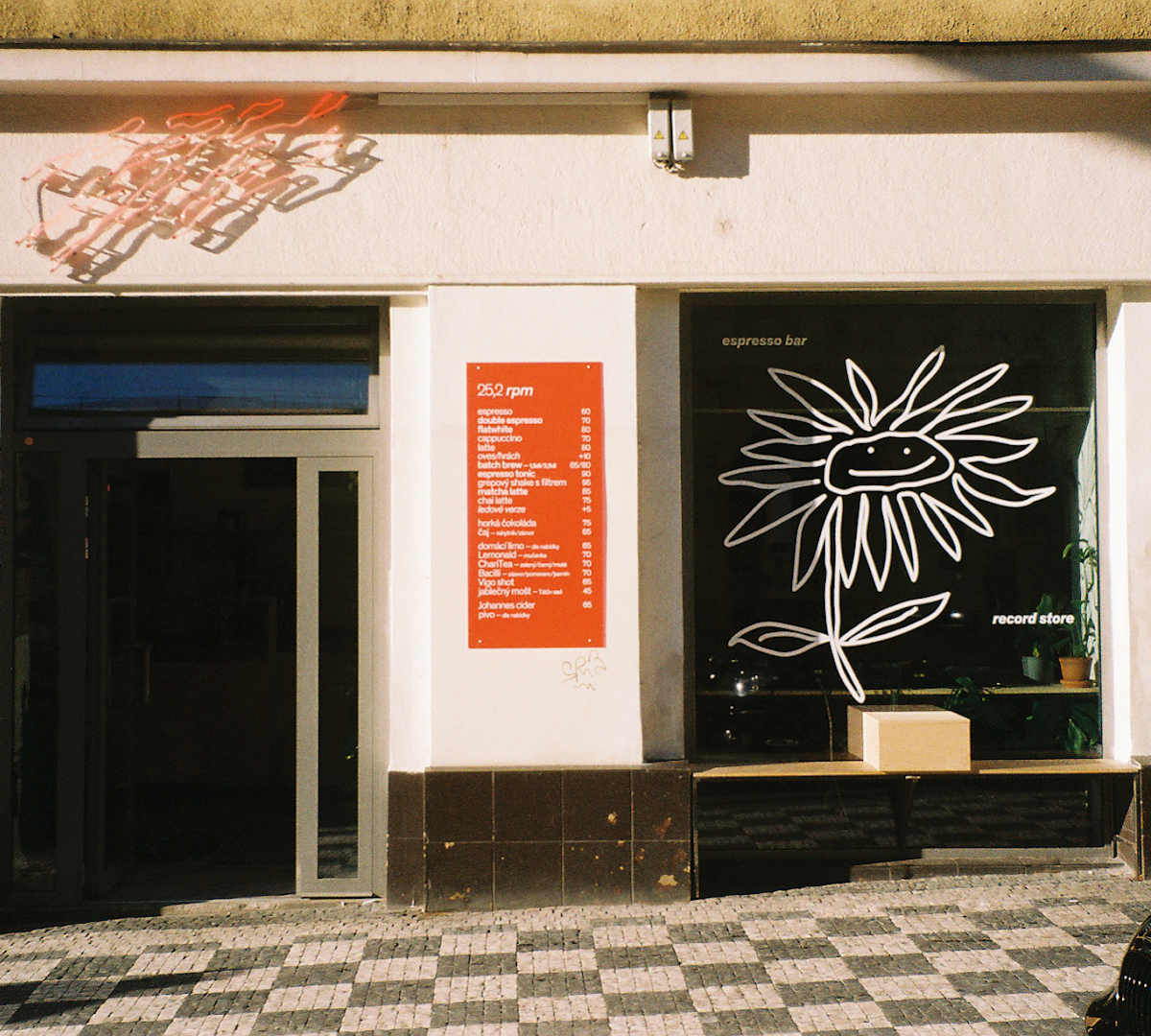 Storefront of 25,2 rpm, specialty coffee shop in Prague