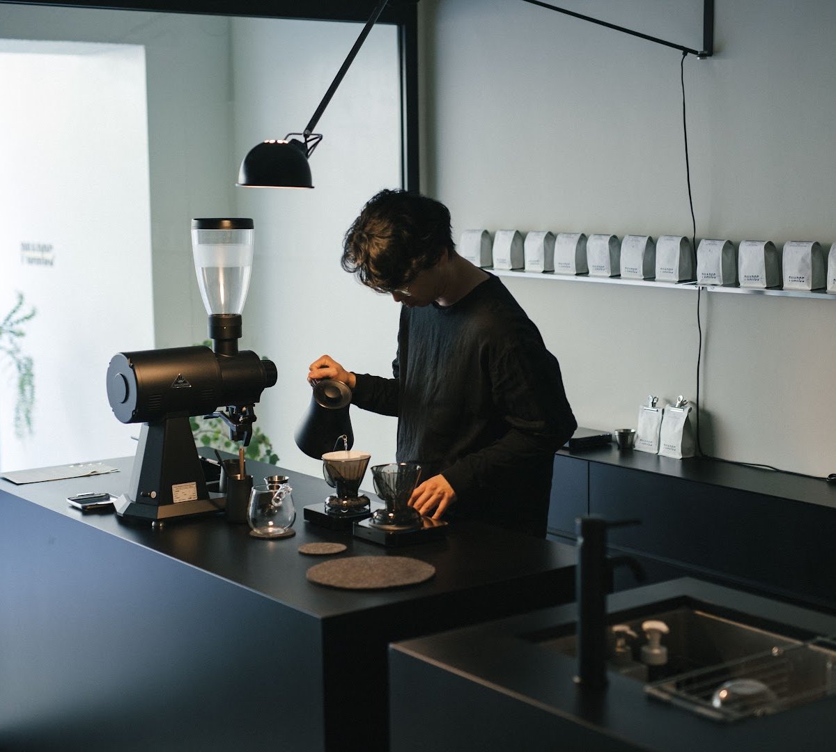 Interior of Pharos Coffee Jimbocho, specialty coffee shop in Tokyo