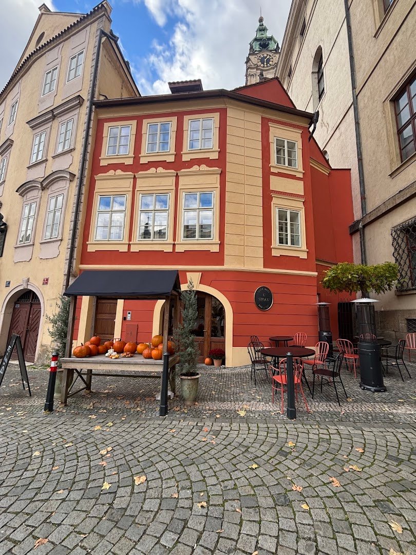 Storefront of U Stolu, specialty coffee shop in Prague