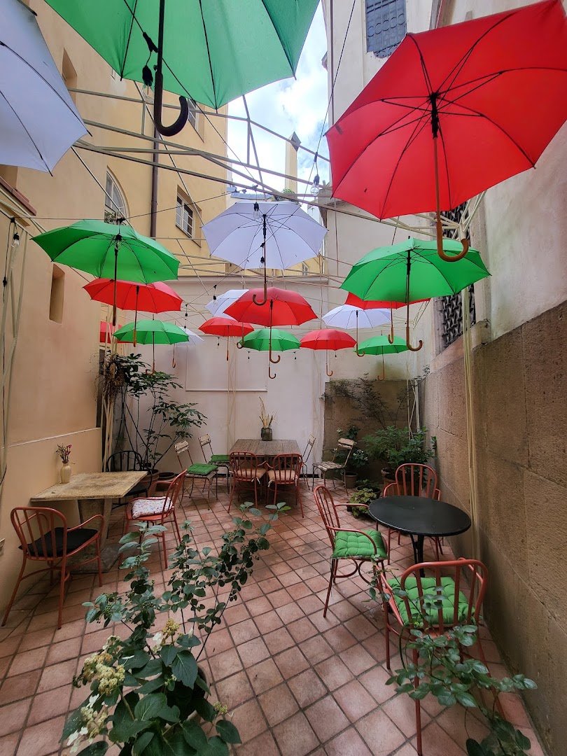 Storefront of U Stolu, specialty coffee shop in Prague