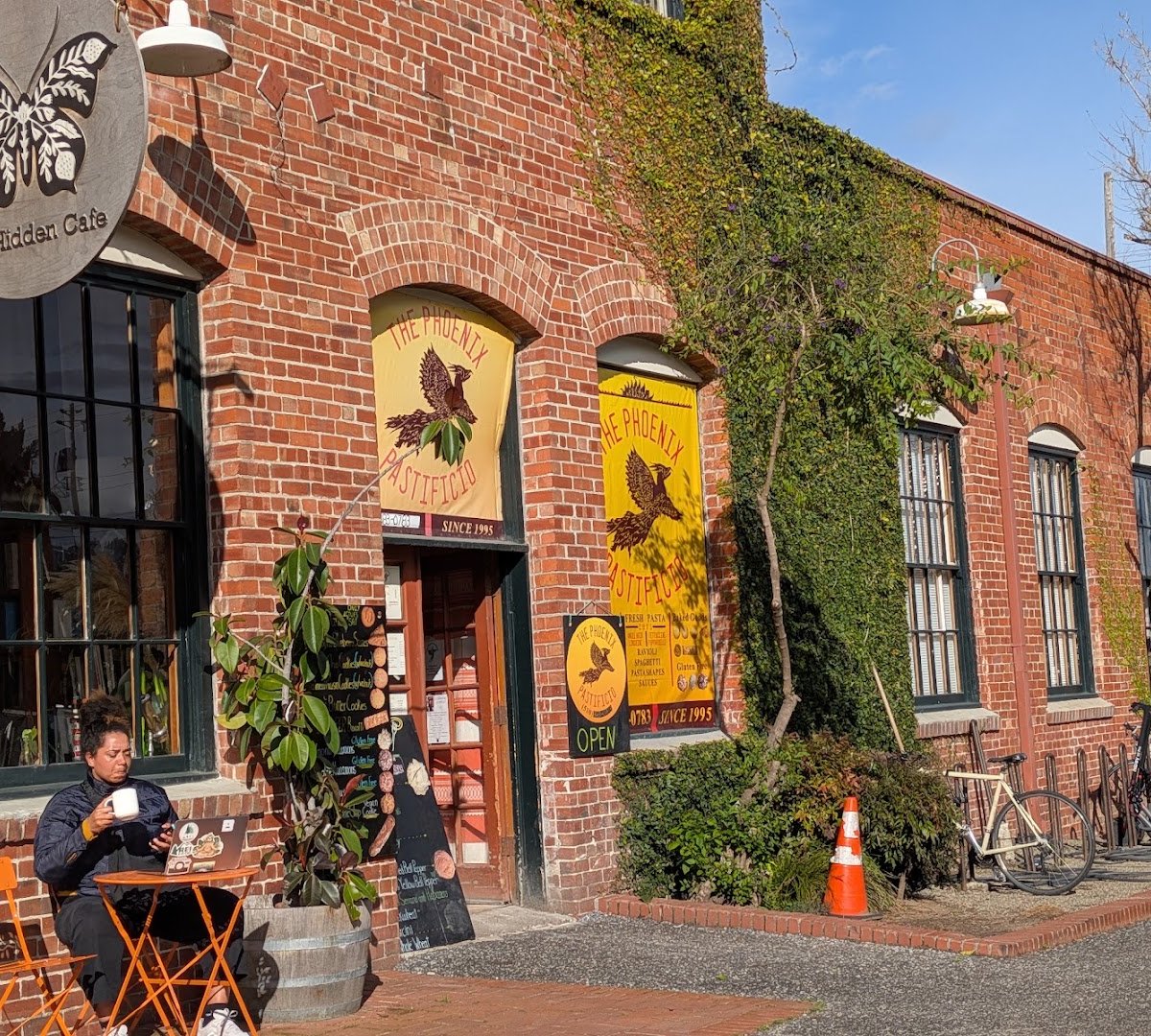 Storefront of The Hidden Cafe, specialty coffee shop in Oakland