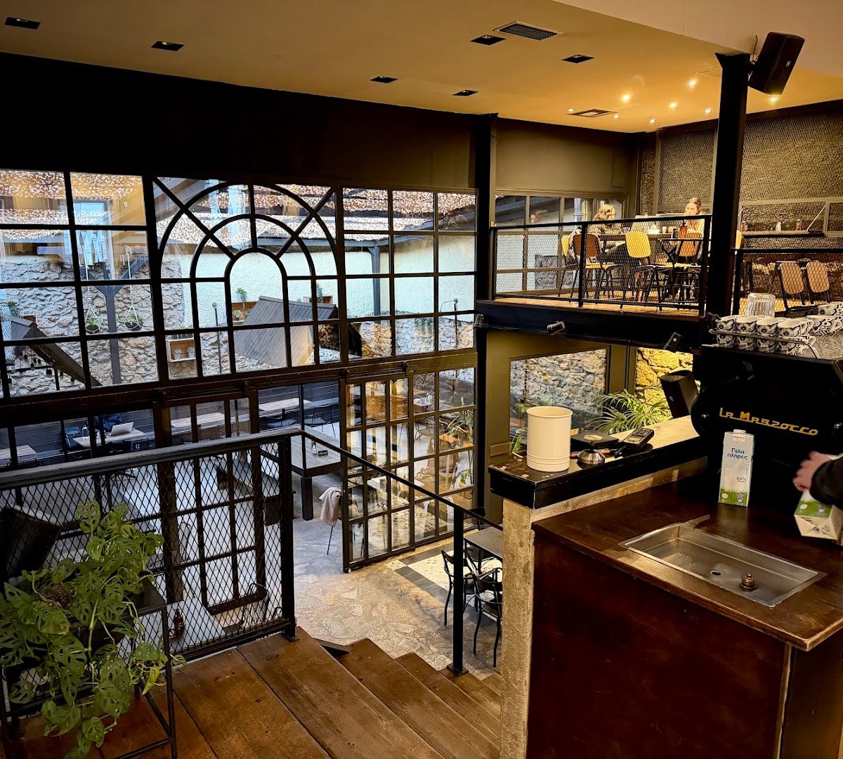 Interior of The Underdog Thissio, specialty coffee shop in Athens