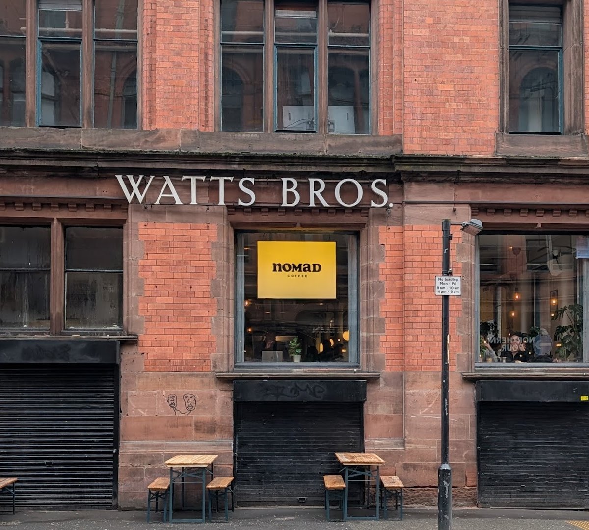 Storefront of Nomad Coffee, specialty coffee shop in Manchester