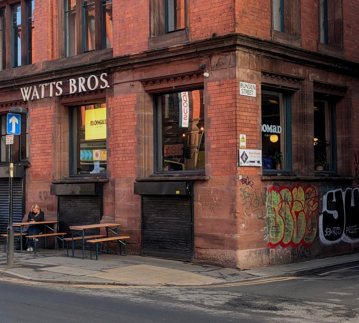 Storefront of Nomad Coffee, specialty coffee shop in Manchester