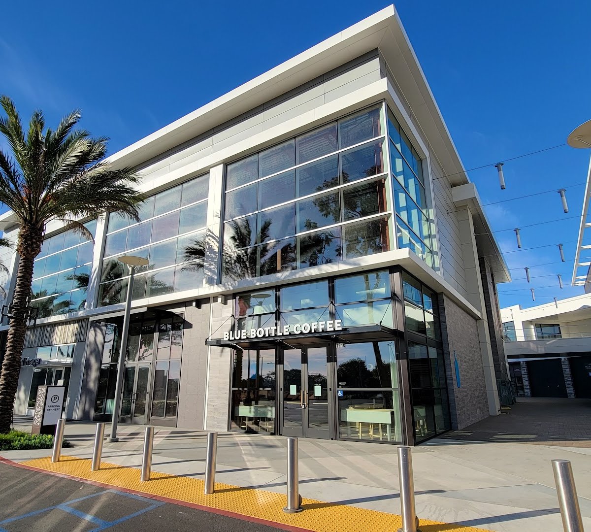 Storefront of Blue Bottle Coffee, specialty coffee shop in San Diego