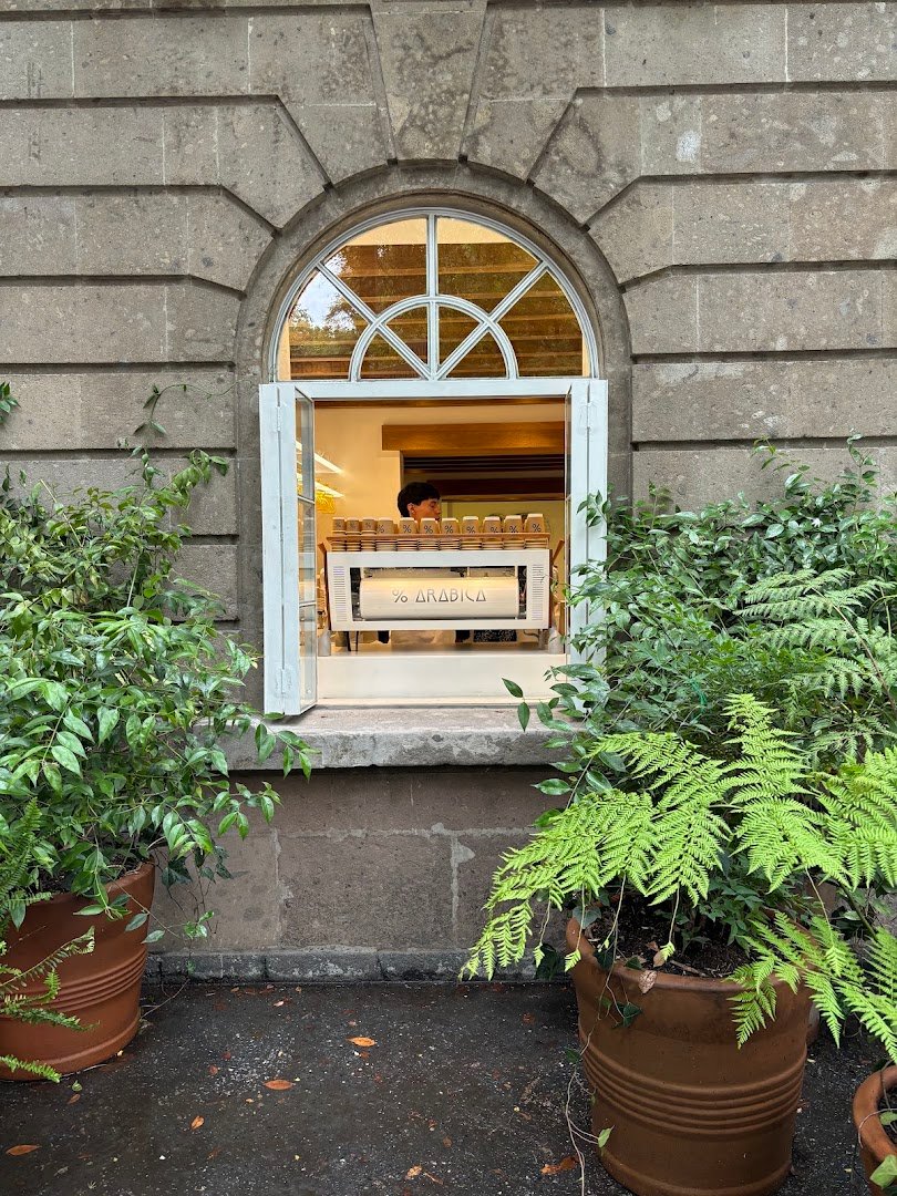 Storefront of % ARABICA, specialty coffee shop in Mexico City