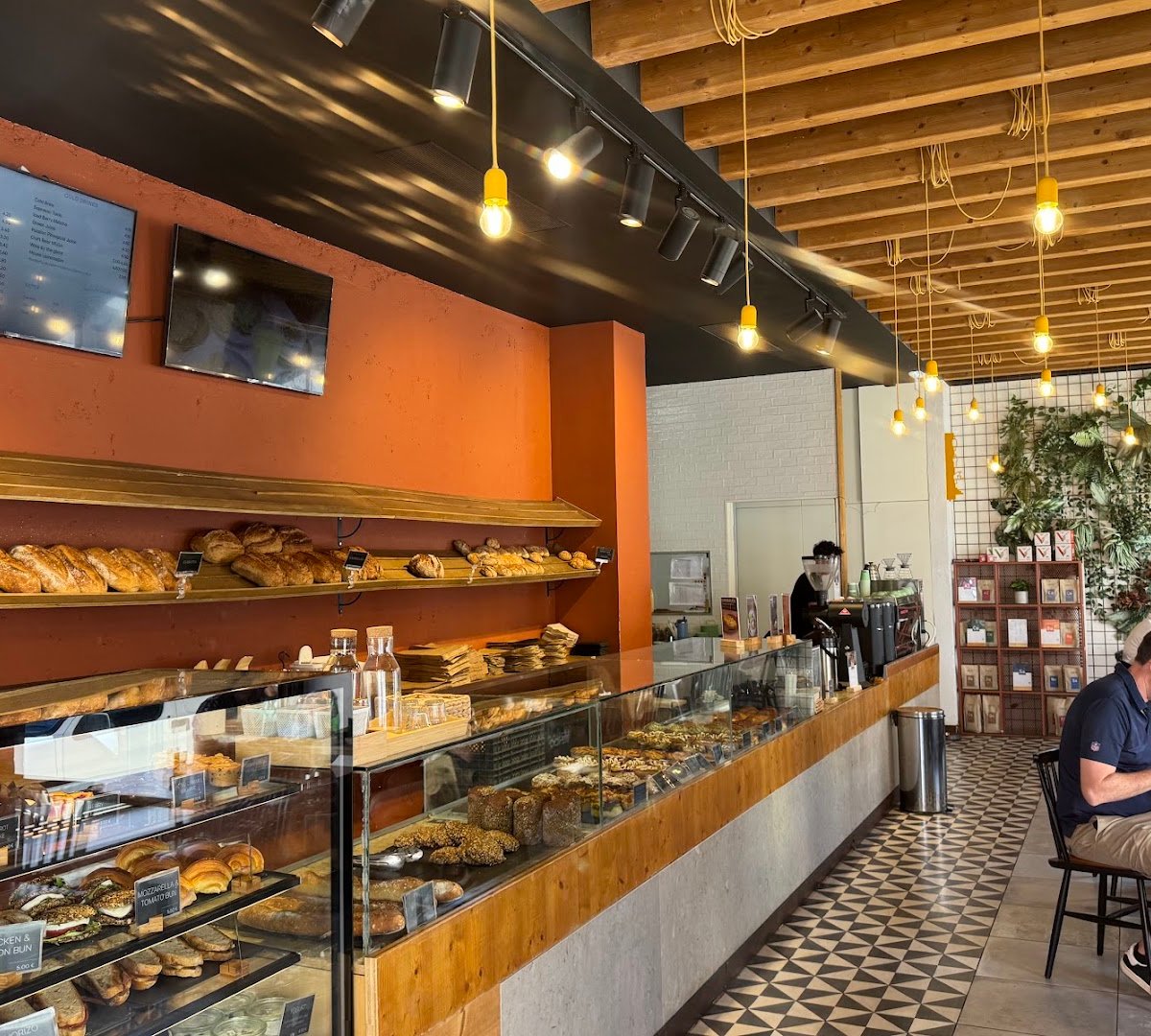Interior of Copenhagen Coffee Lab - Campo de Ourique, specialty coffee shop in Lisbon