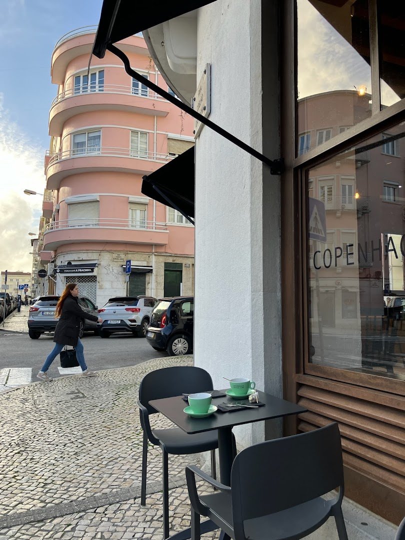 Storefront of Copenhagen Coffee Lab - Campo de Ourique, specialty coffee shop in Lisbon