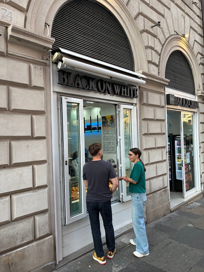 Storefront of Black on White-Bar Roma, specialty coffee shop in Rome
