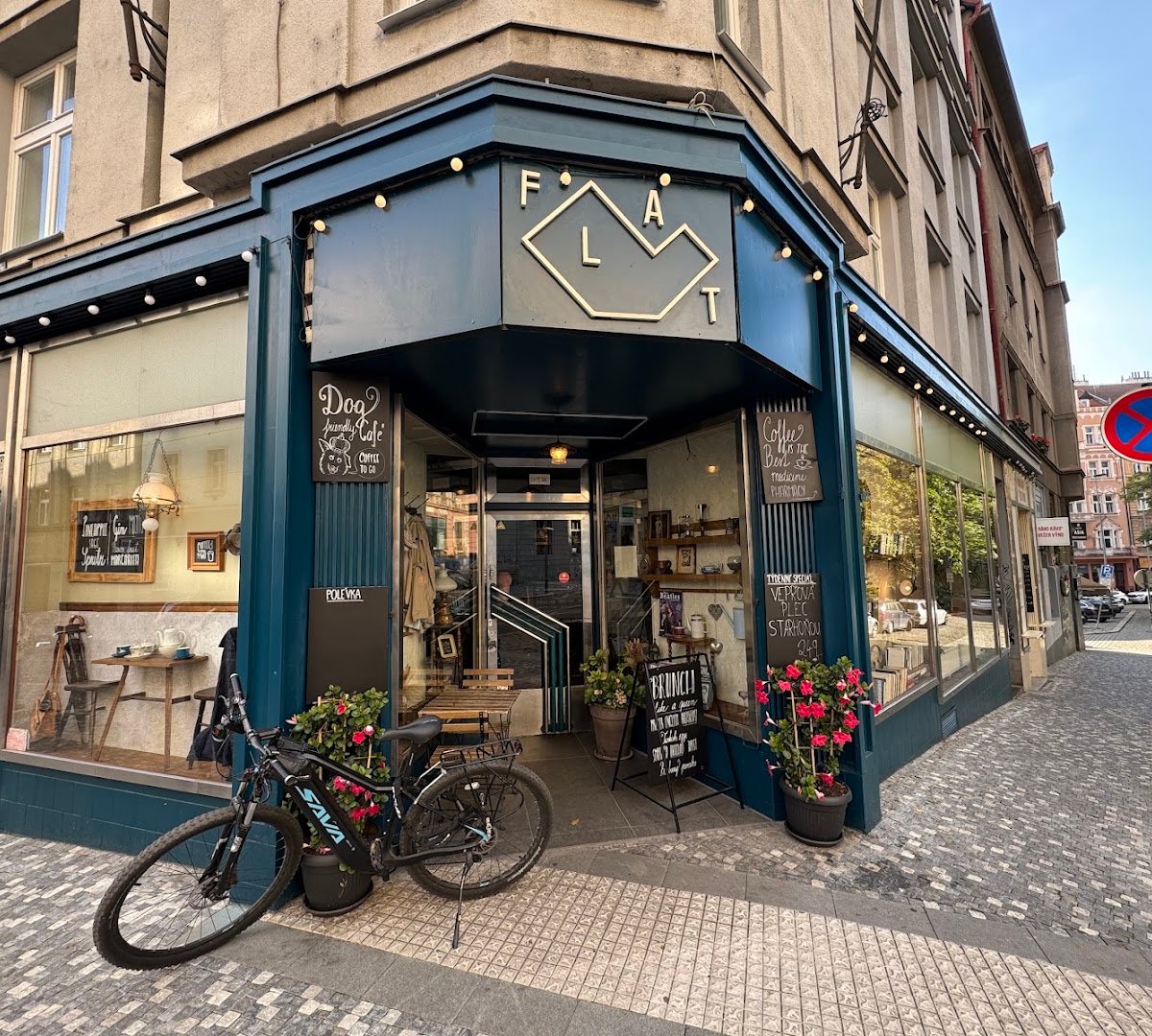 Storefront of The FLAT cafe, specialty coffee shop in Prague