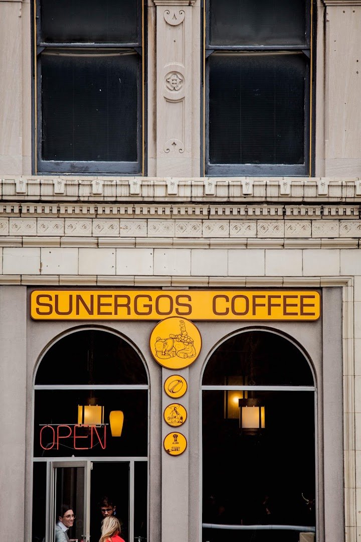 Storefront of Sunergos Coffee, specialty coffee shop in Louisville