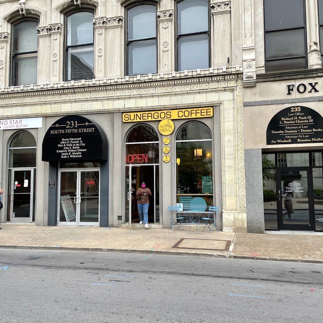 Storefront of Sunergos Coffee, specialty coffee shop in Louisville
