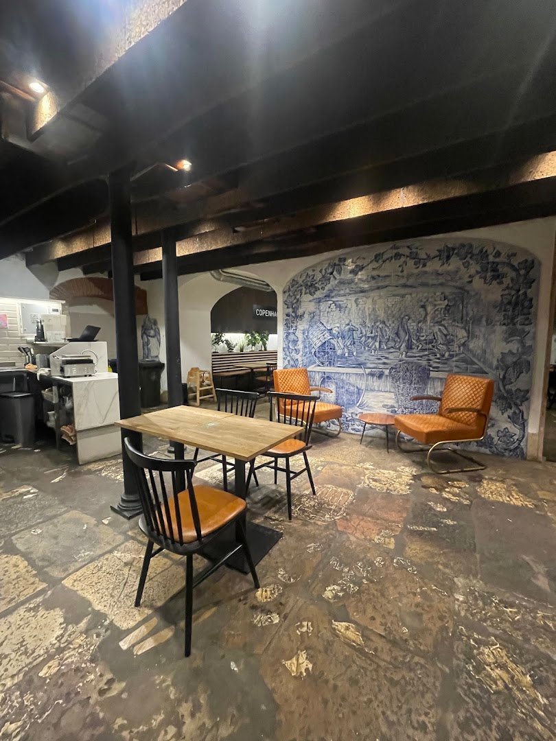 Interior of Copenhagen Coffee Lab Bacalhoeiros, specialty coffee shop in Lisbon