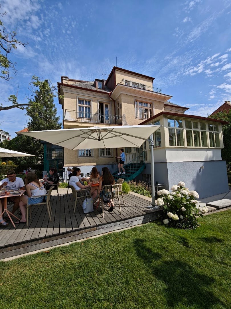 Storefront of Vila 63, specialty coffee shop in Prague