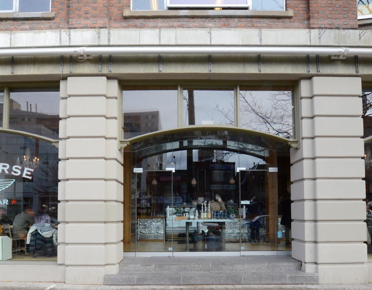 Storefront of Dark Horse Espresso Bar, specialty coffee shop in Toronto