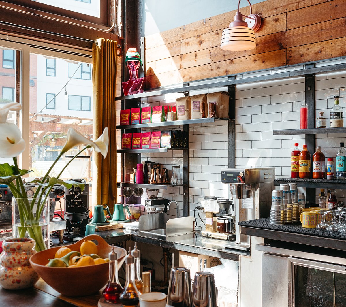Interior of Mother Tongue Cafe & Bar, specialty coffee shop in Oakland