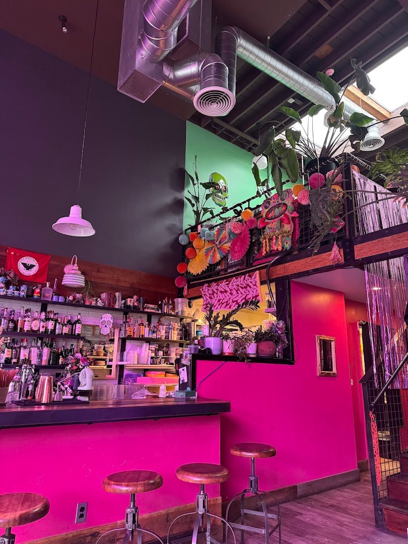 Interior of Mother Tongue Cafe & Bar, specialty coffee shop in Oakland