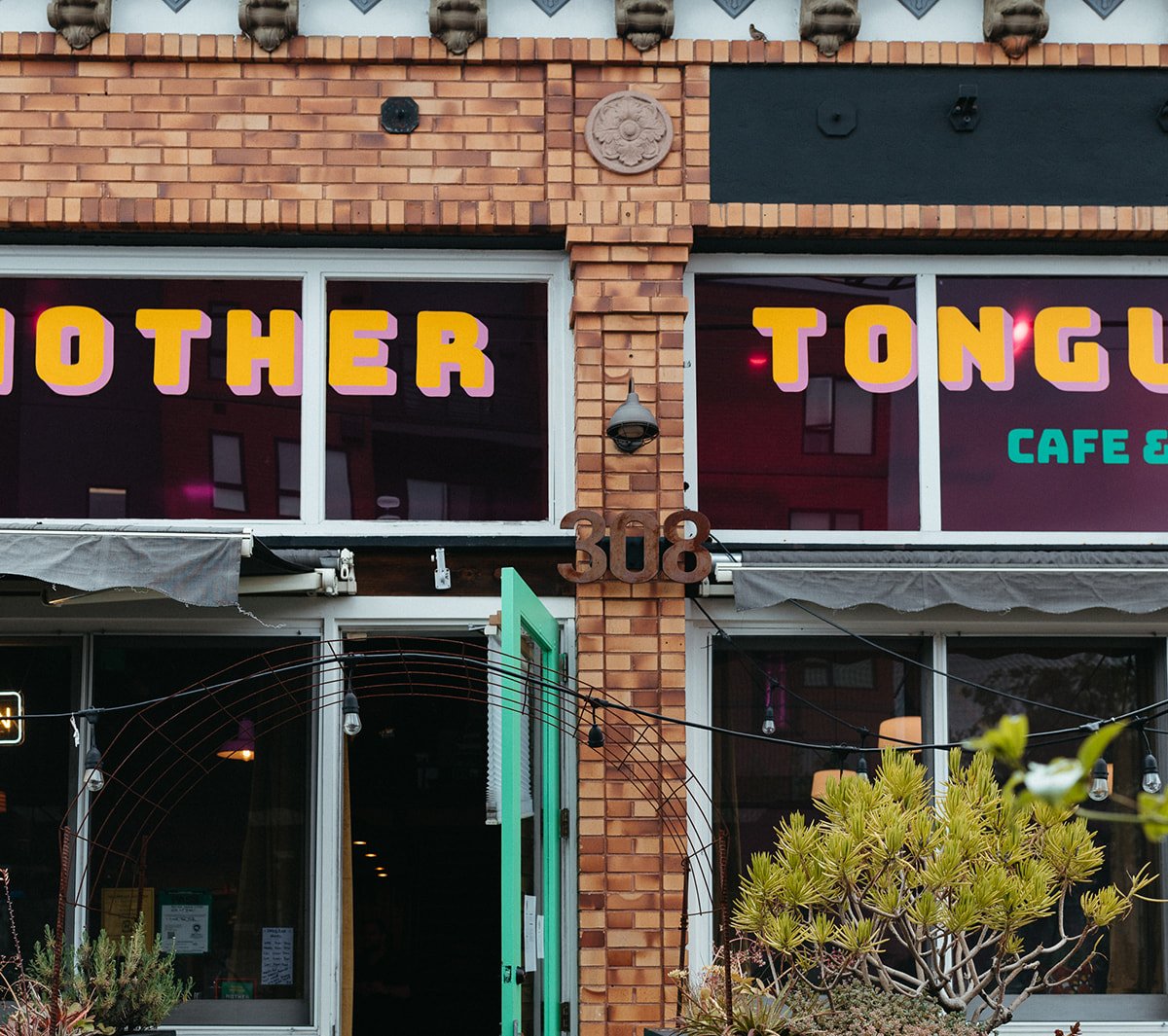 Storefront of Mother Tongue Cafe & Bar, specialty coffee shop in Oakland