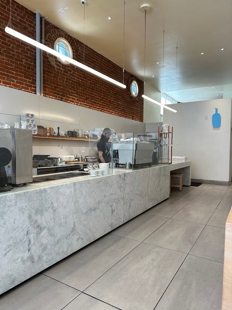 Interior of Blue Bottle Coffee, specialty coffee shop in Oakland