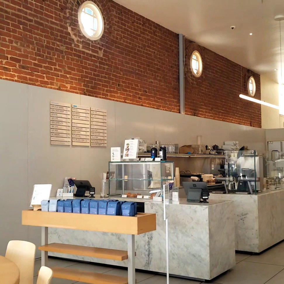 Interior of Blue Bottle Coffee, specialty coffee shop in Oakland