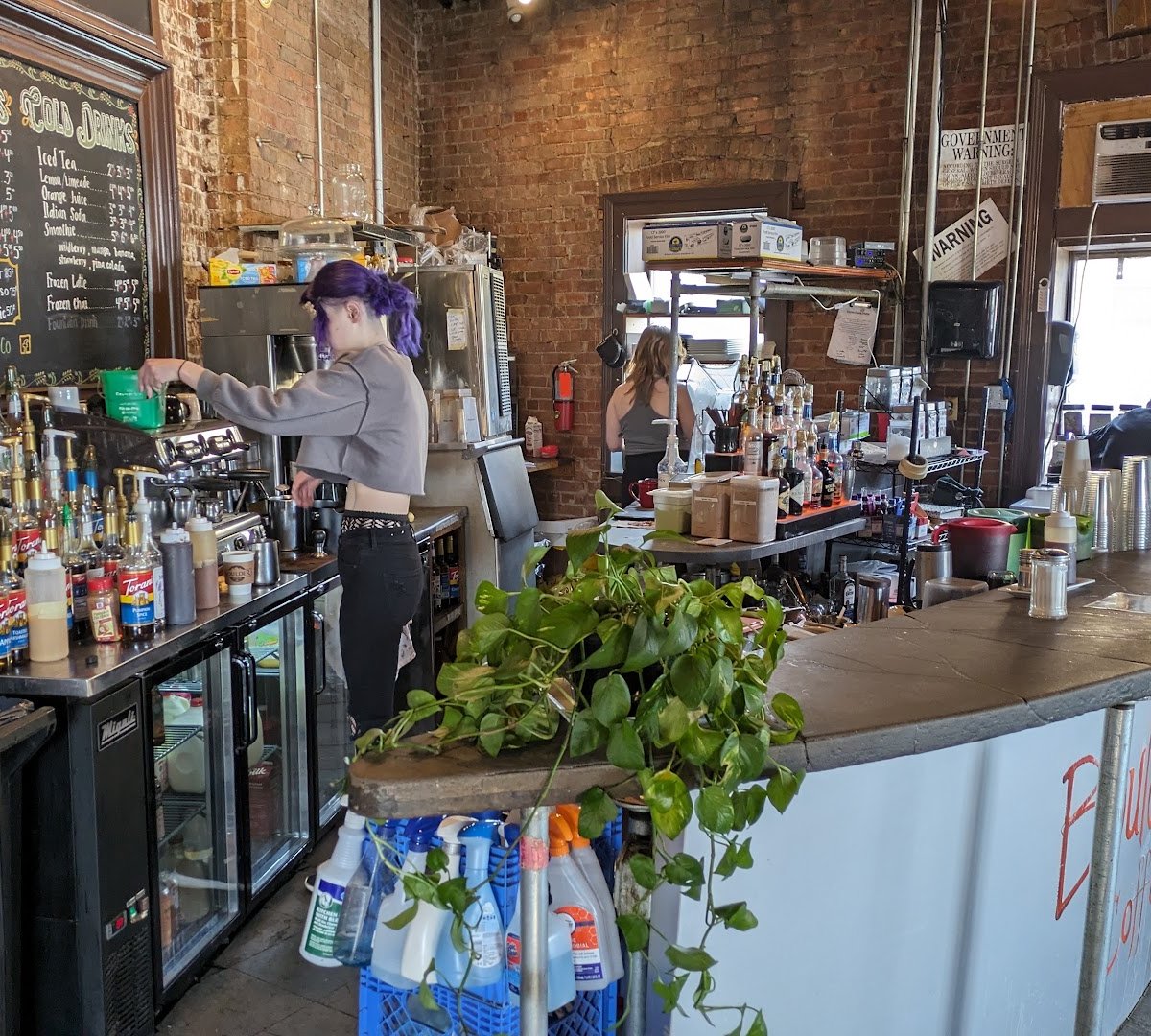 Interior of Boulder Coffee Co Cafe and Lounge, specialty coffee shop in Rochester
