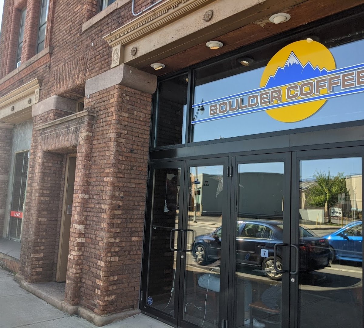 Storefront of Boulder Coffee Co Cafe and Lounge, specialty coffee shop in Rochester