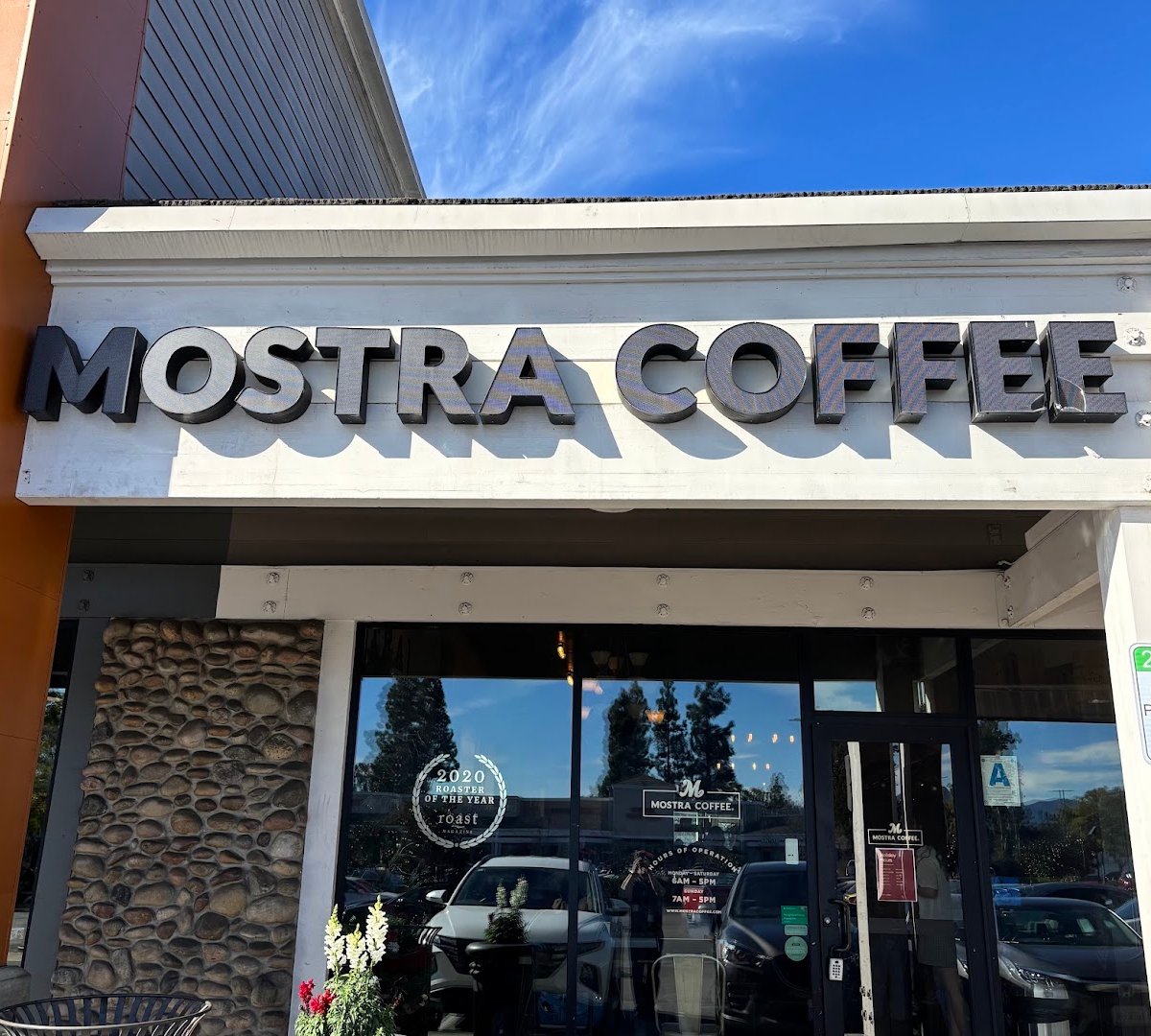 Storefront of Mostra Coffee, specialty coffee shop in San Diego