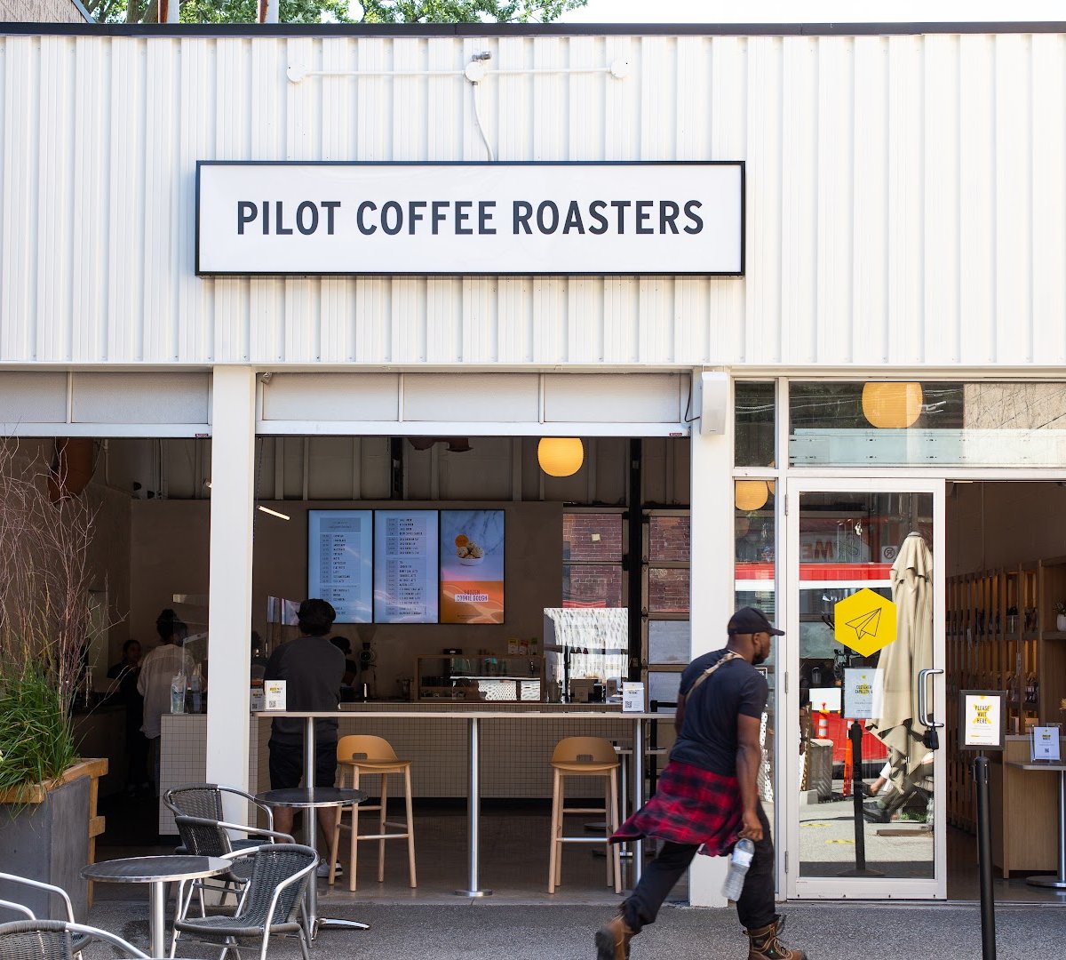 Storefront of Pilot Coffee Roasters, specialty coffee shop in Toronto