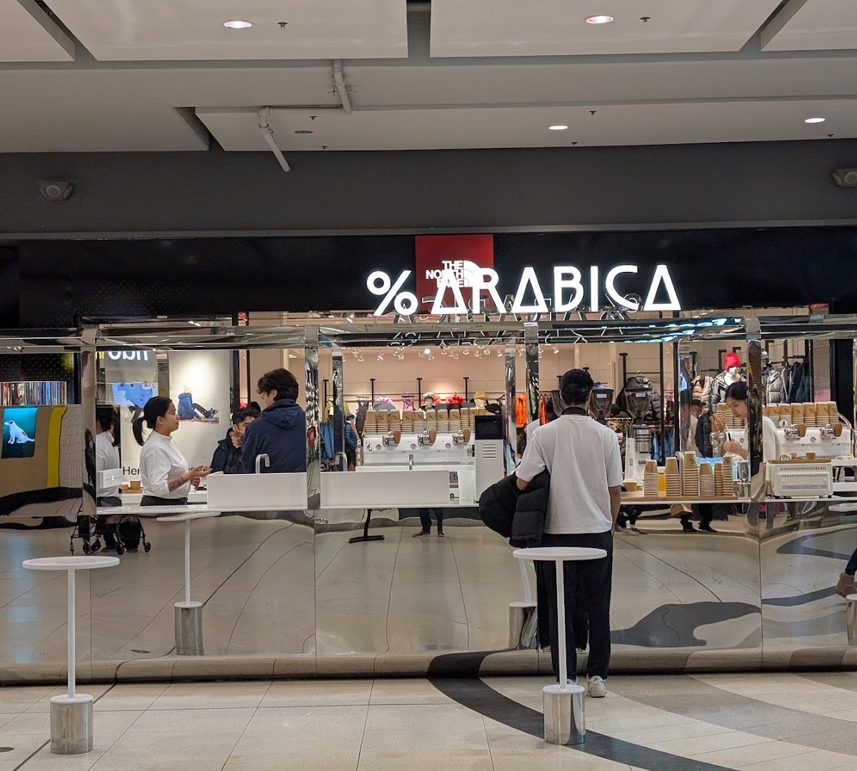 Storefront of % Arabica Toronto Eaton Centre, specialty coffee shop in Toronto
