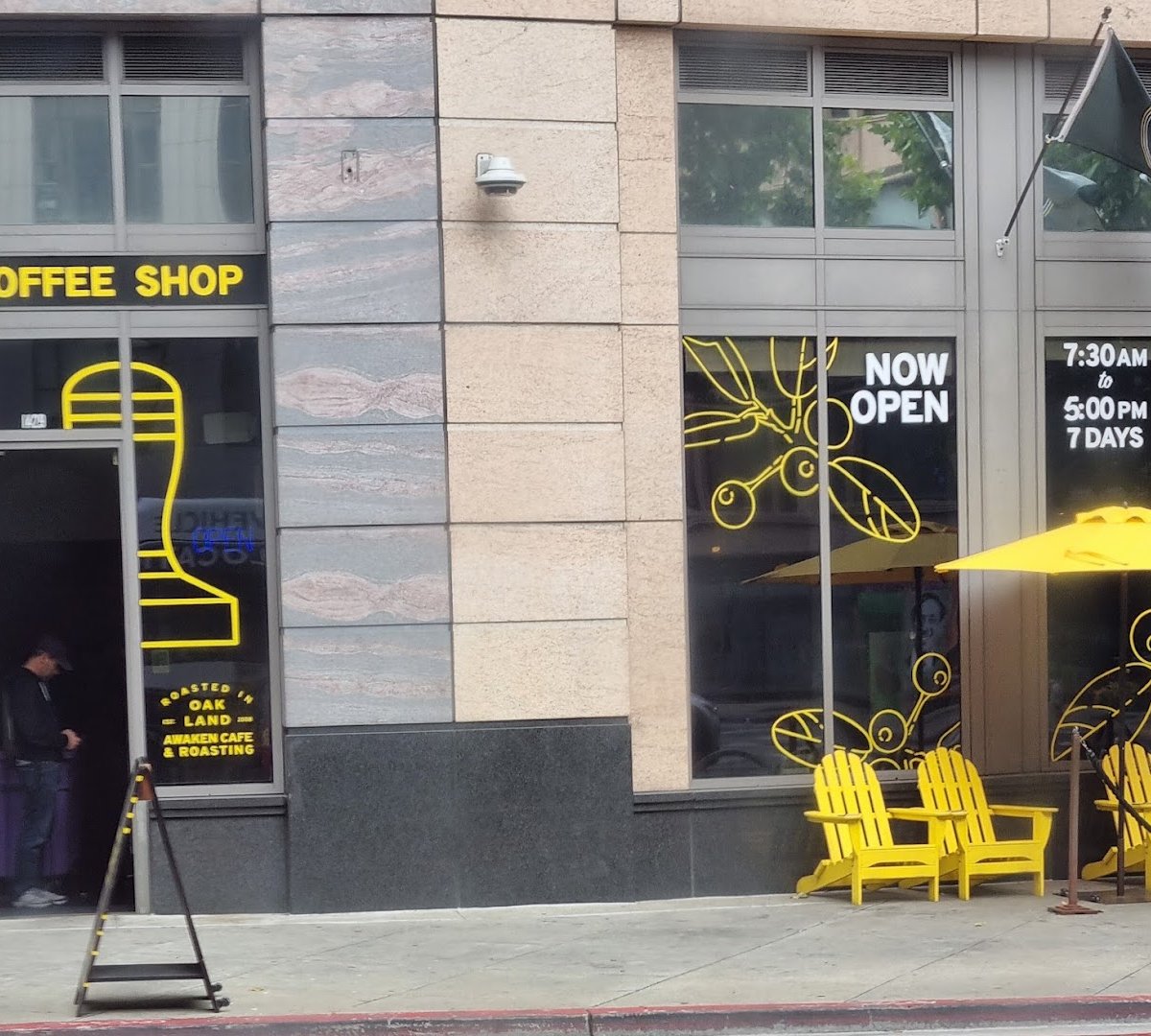 Storefront of Awaken Cafe & Roasting, specialty coffee shop in Oakland